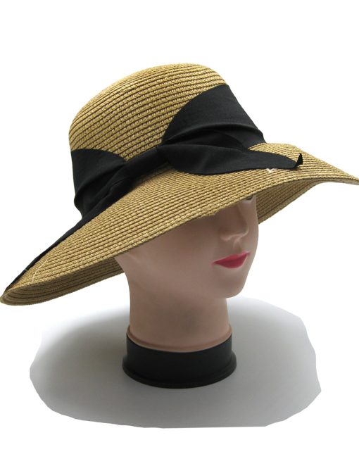 Straw hat with black bow