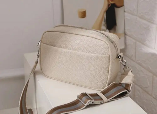 Cream cross body bag