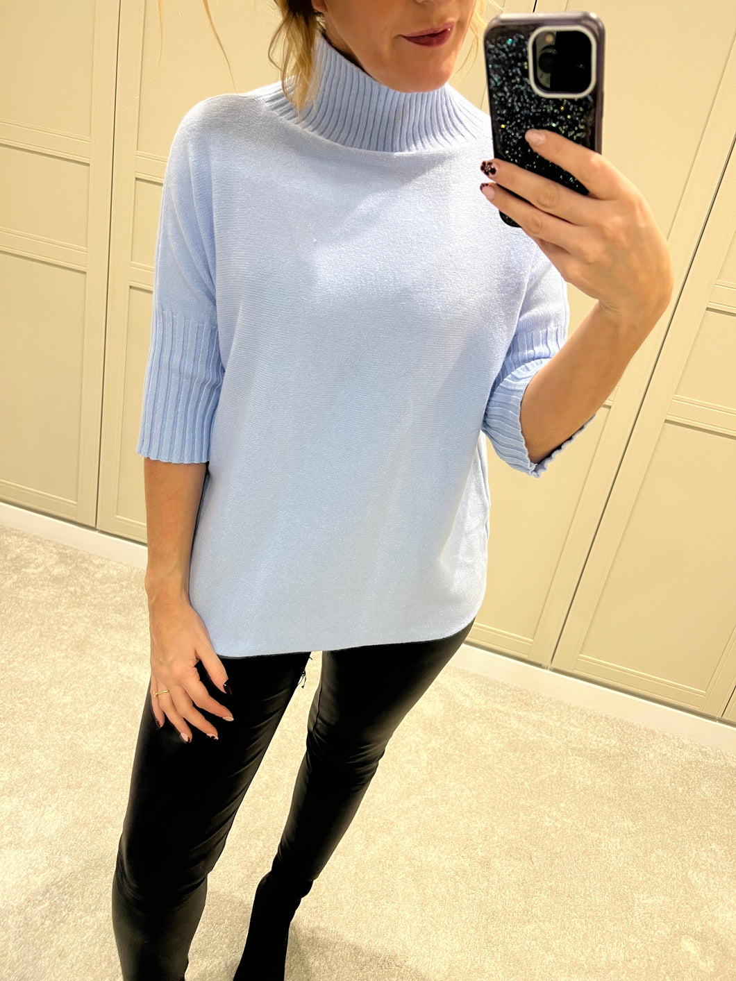 Baby blue ribbed polo neck jumper