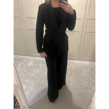 Black pinstripe blazer