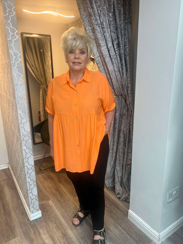 Loose orange shirt