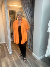 Loose orange shirt